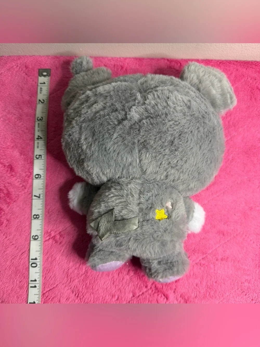 Gray Plush Character Doll with Pink Accents and Star Bow